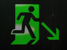Exit sign of a man who really wants to get out of here